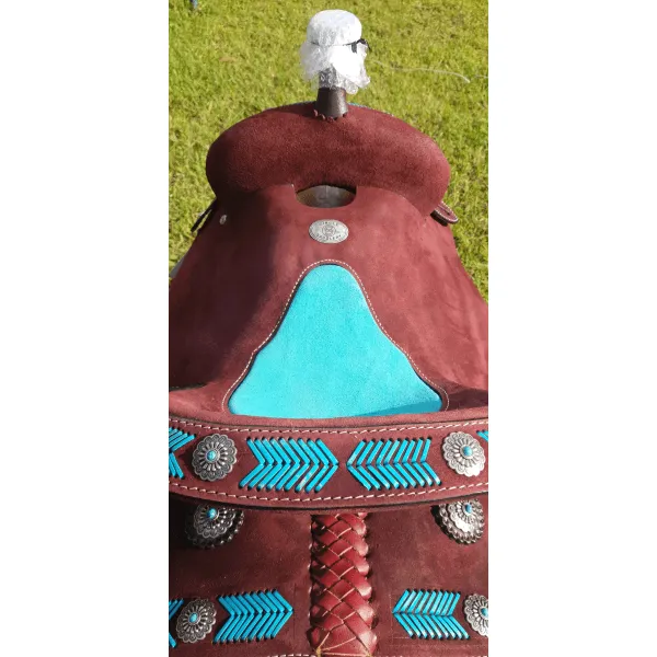 15", 16" Circle S Barrel Style Saddle with turquoise leather laced arrow trim.