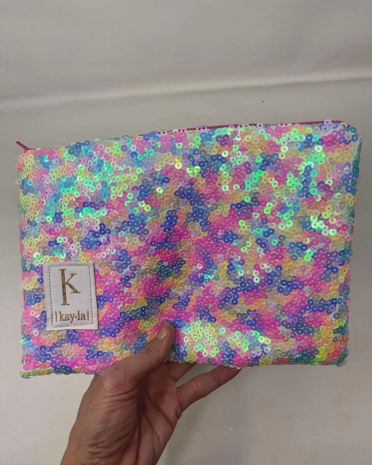 Sparkle Era, Kayla clutch